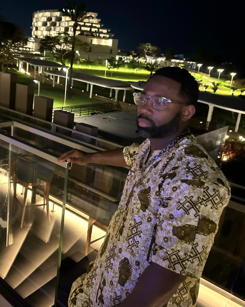 Alonzo Waheed Sr. on a balcony at night